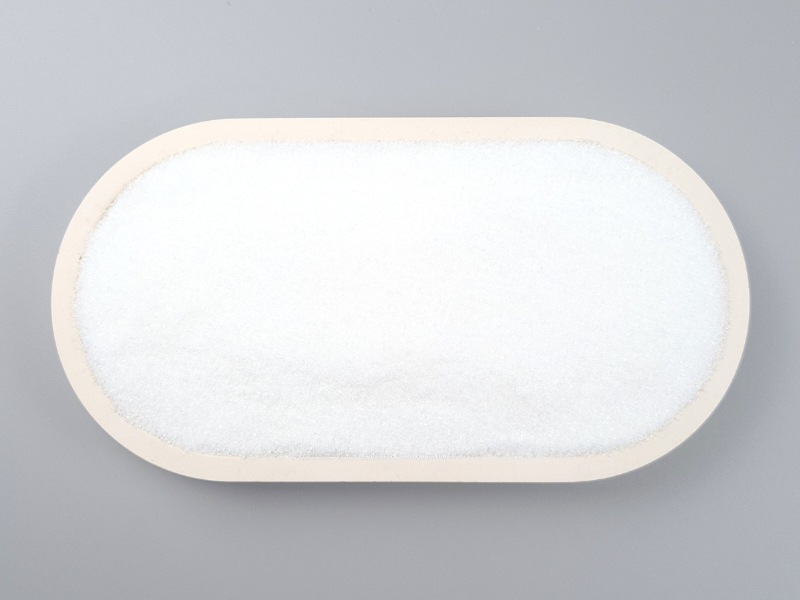L-Glycin-Pulver in einer Schale von oben