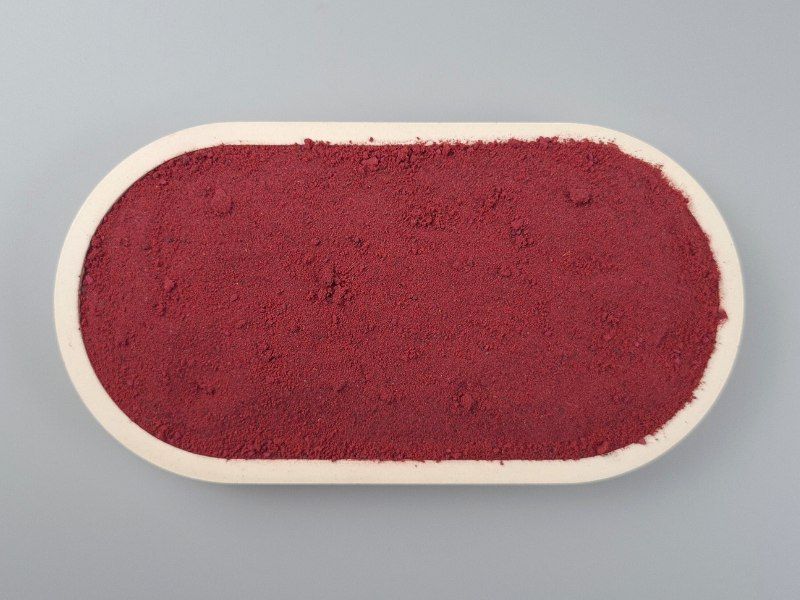 Rotes Glas Smoothiepulver von oben