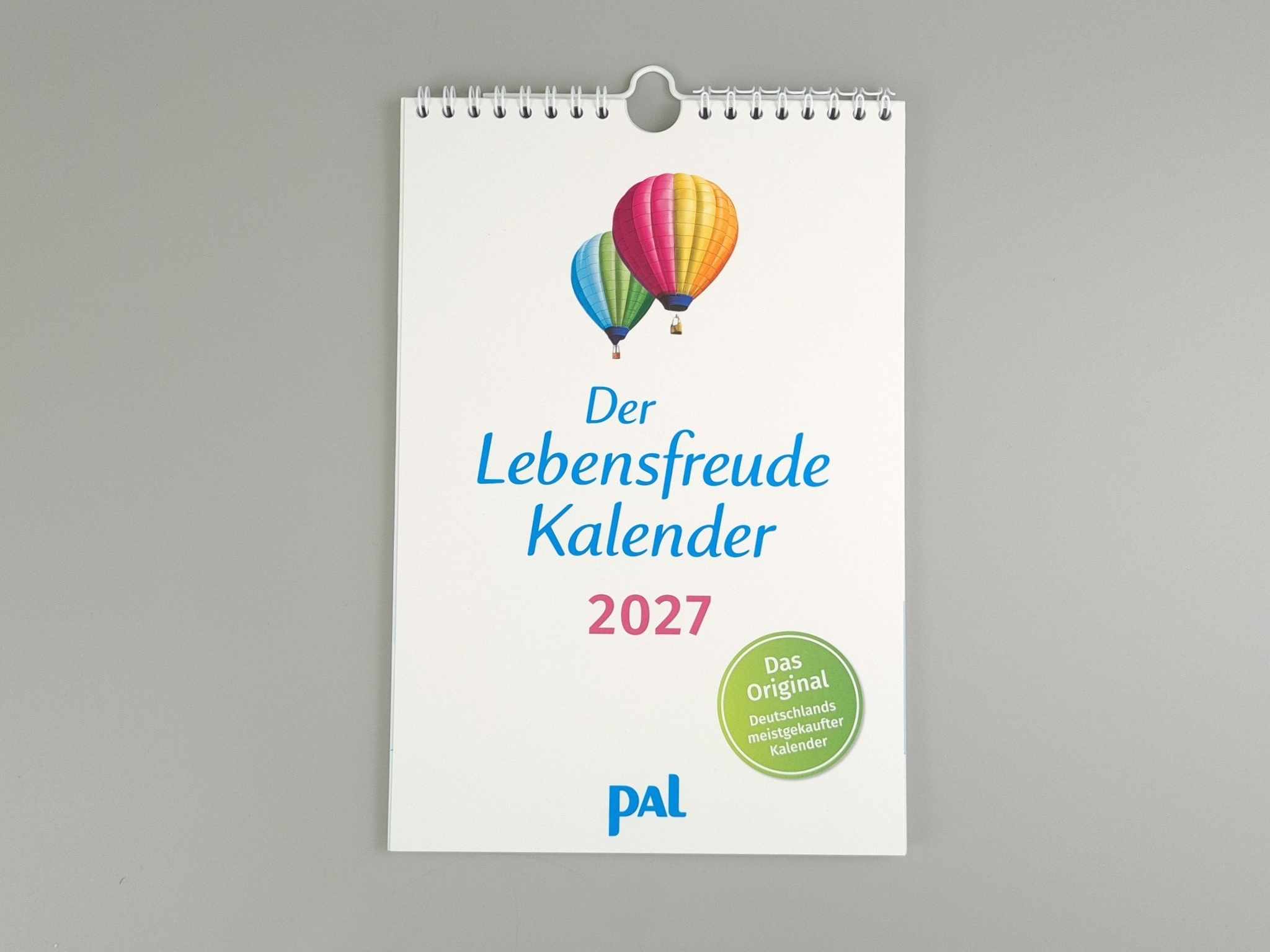Lebensfreude Kalender 2027 Vorderseite auf grauem Hintergrund